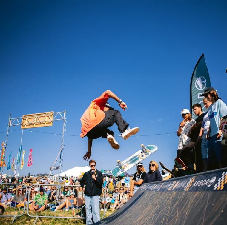 Skate ramps at an event with a crowd